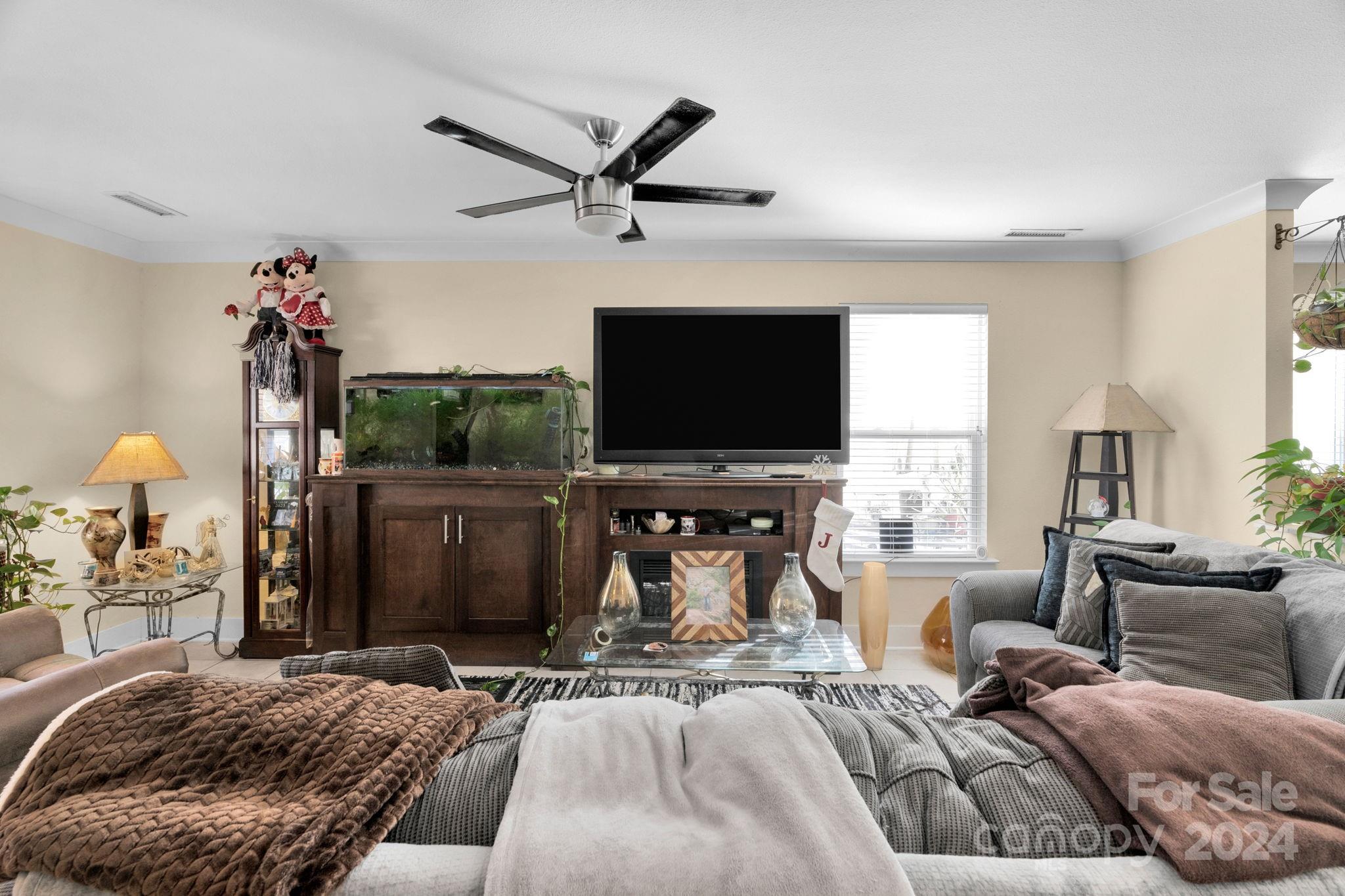 738 Sinclair Drive Monroe, NC 28112 - Photo 4 of 33 a bedroom with a bed and a flat screen tv