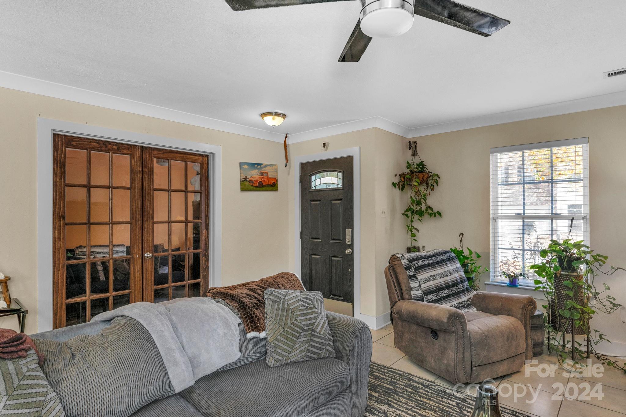 738 Sinclair Drive Monroe, NC 28112 - Photo 7 of 33 a living room with furniture and a large window