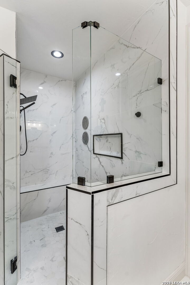 1330 Palmetto Point Spring Branch, TX 78070 - Photo 20 of 43 a bathroom with a shower and mirror