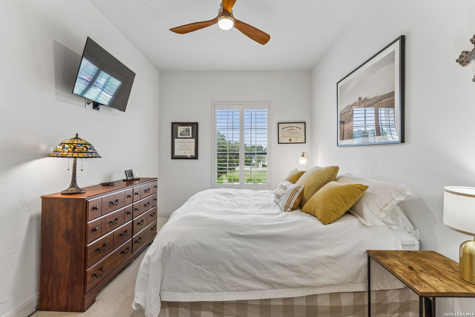 1330 Palmetto Point Spring Branch, TX 78070 - Photo 23 of 43 a bedroom with a bed and a flat screen tv