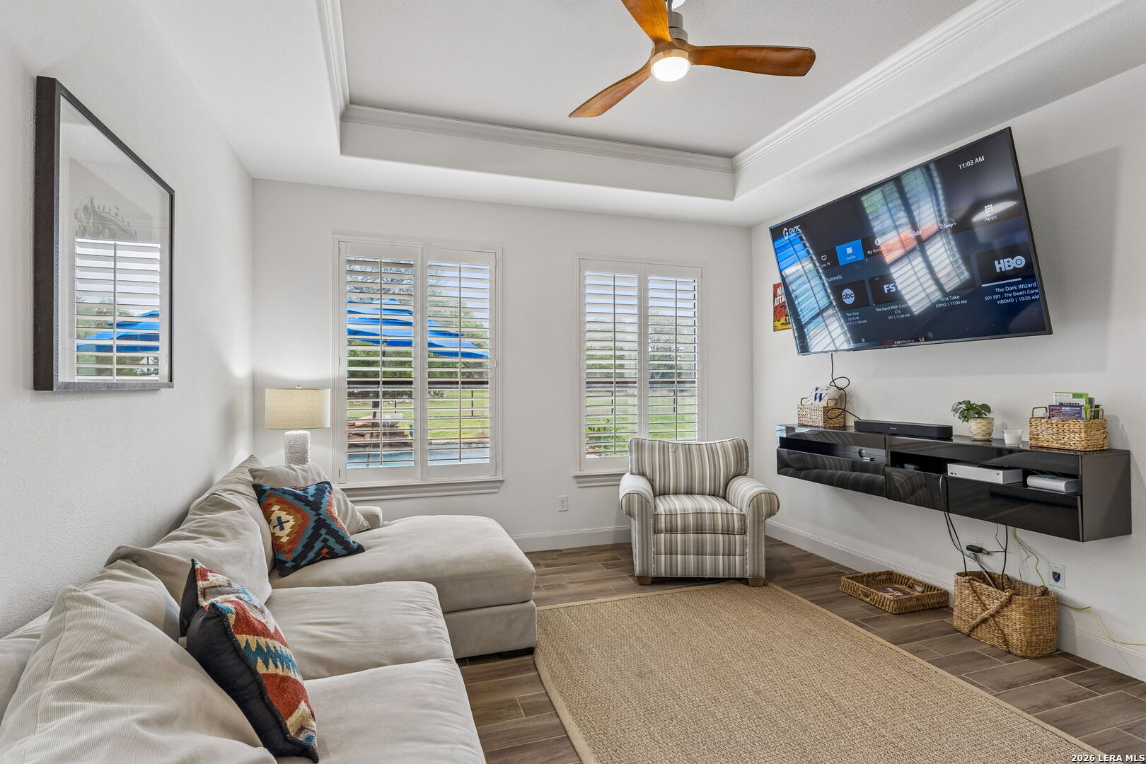 1330 Palmetto Point Spring Branch, TX 78070 - Photo 24 of 43 a living room with furniture and a flat screen tv