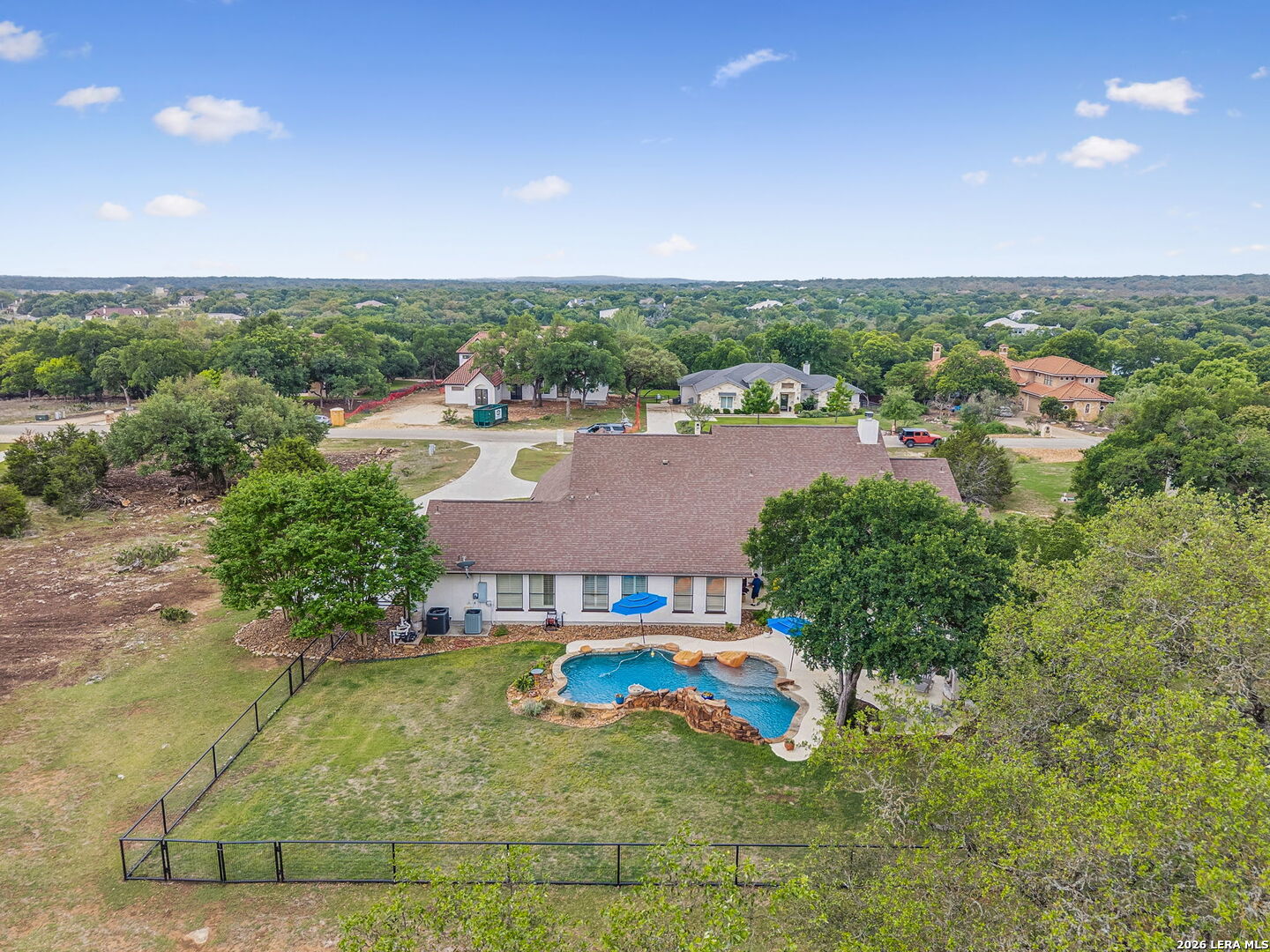 1330 Palmetto Point Spring Branch, TX 78070 - Photo 36 of 43 an aerial view of a house with a yard and lake view