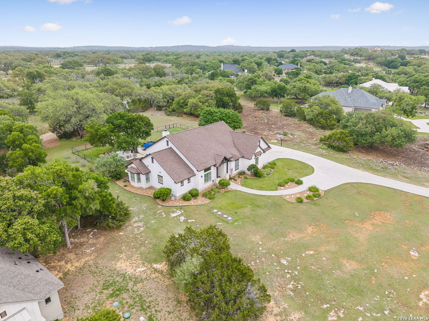1330 Palmetto Point Spring Branch, TX 78070 - Photo 37 of 43 an aerial view of residential houses with outdoor space and trees