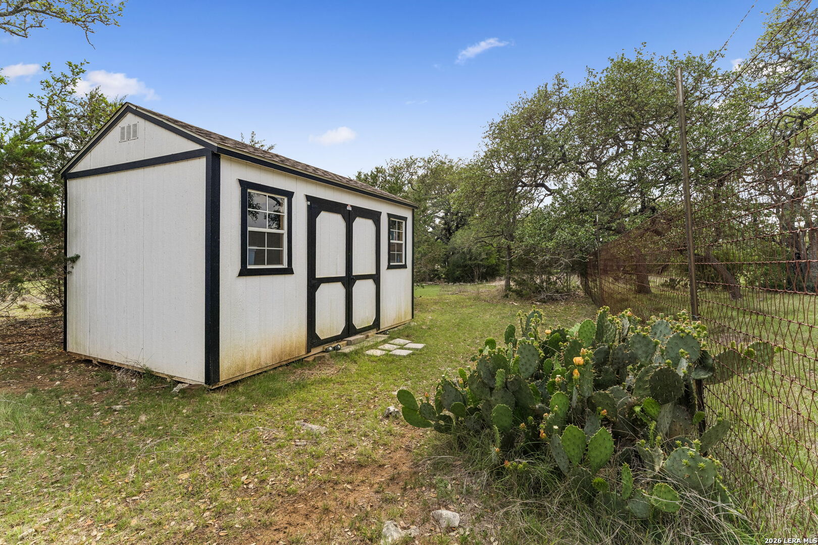 1330 Palmetto Point Spring Branch, TX 78070 - Photo 42 of 43 a view of a barn in the middle of a yard