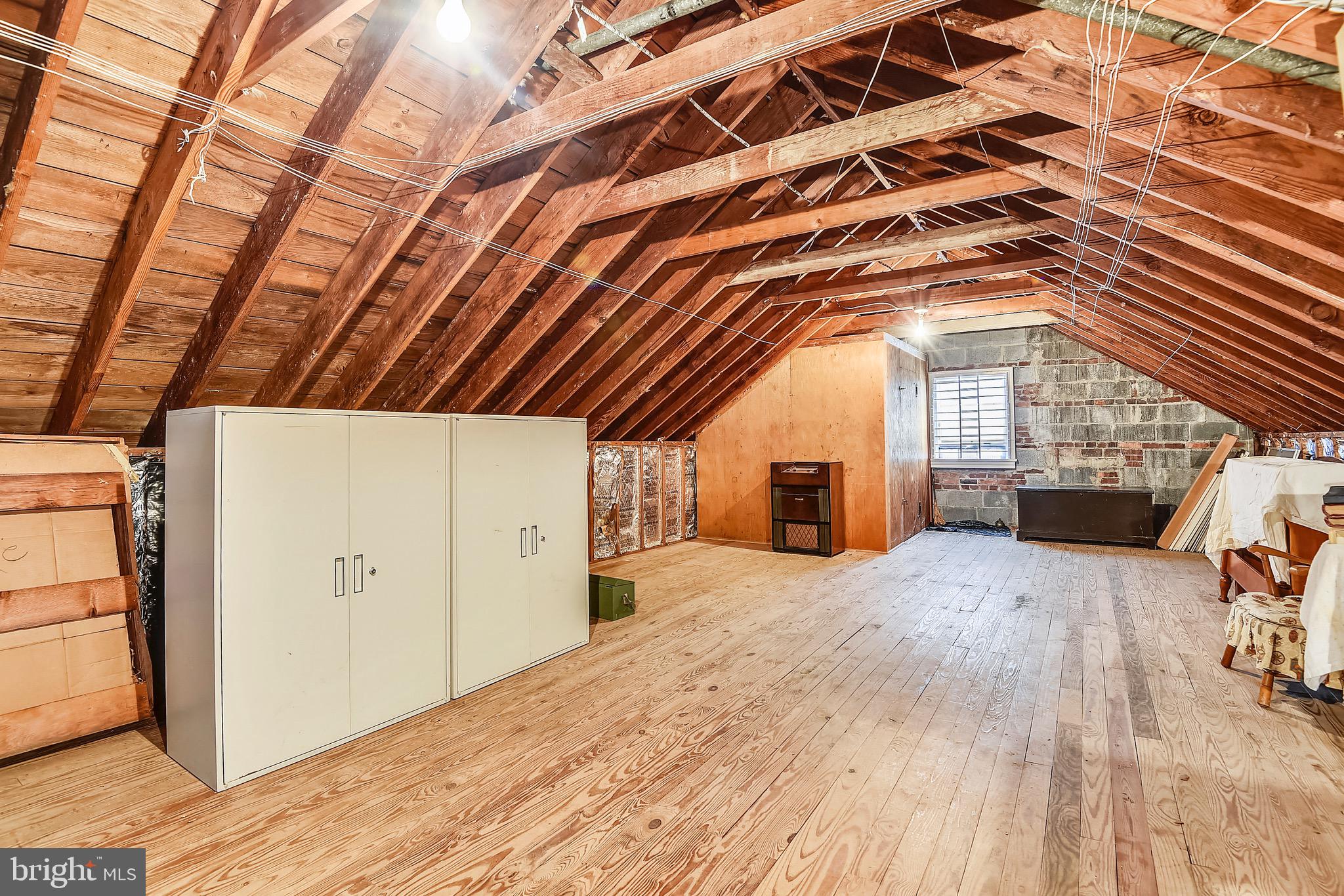 5105 Springlake Way Baltimore, MD 21212 - Photo 37 of 57 Attic w oak floor, windows , reno possibility