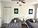 3120 Seasons Way, Unit 309 Estero, FL 33928 - Photo 12 of 33 a living room with furniture and a fireplace