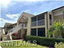 3120 Seasons Way, Unit 309 Estero, FL 33928 - Photo 15 of 33 a front view of a house with a yard
