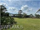 3120 Seasons Way, Unit 309 Estero, FL 33928 - Photo 24 of 33 a view of a green yard