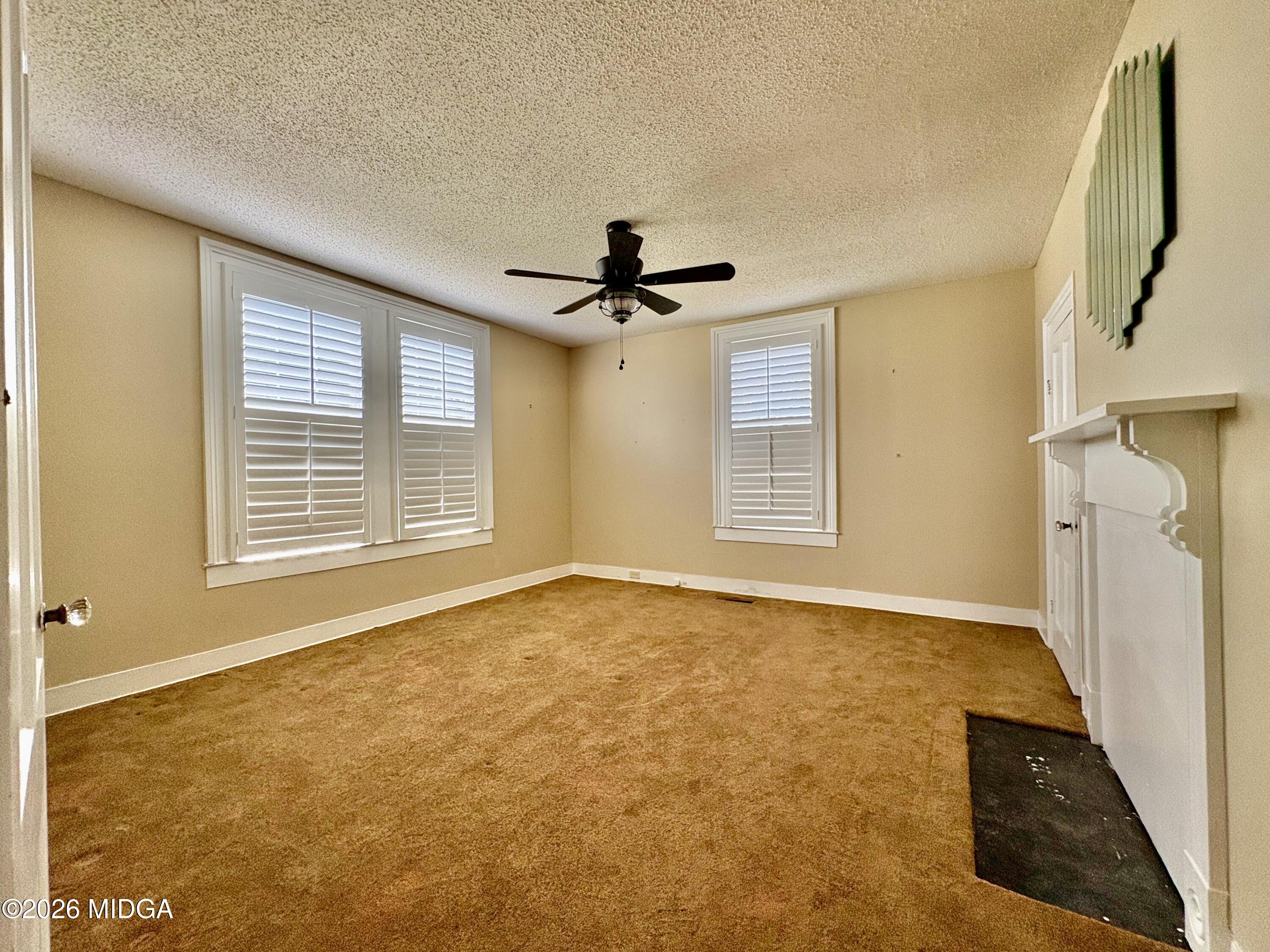 205 White Road Byron, GA 31008 - Photo 19 of 38 a view of an empty room with a window
