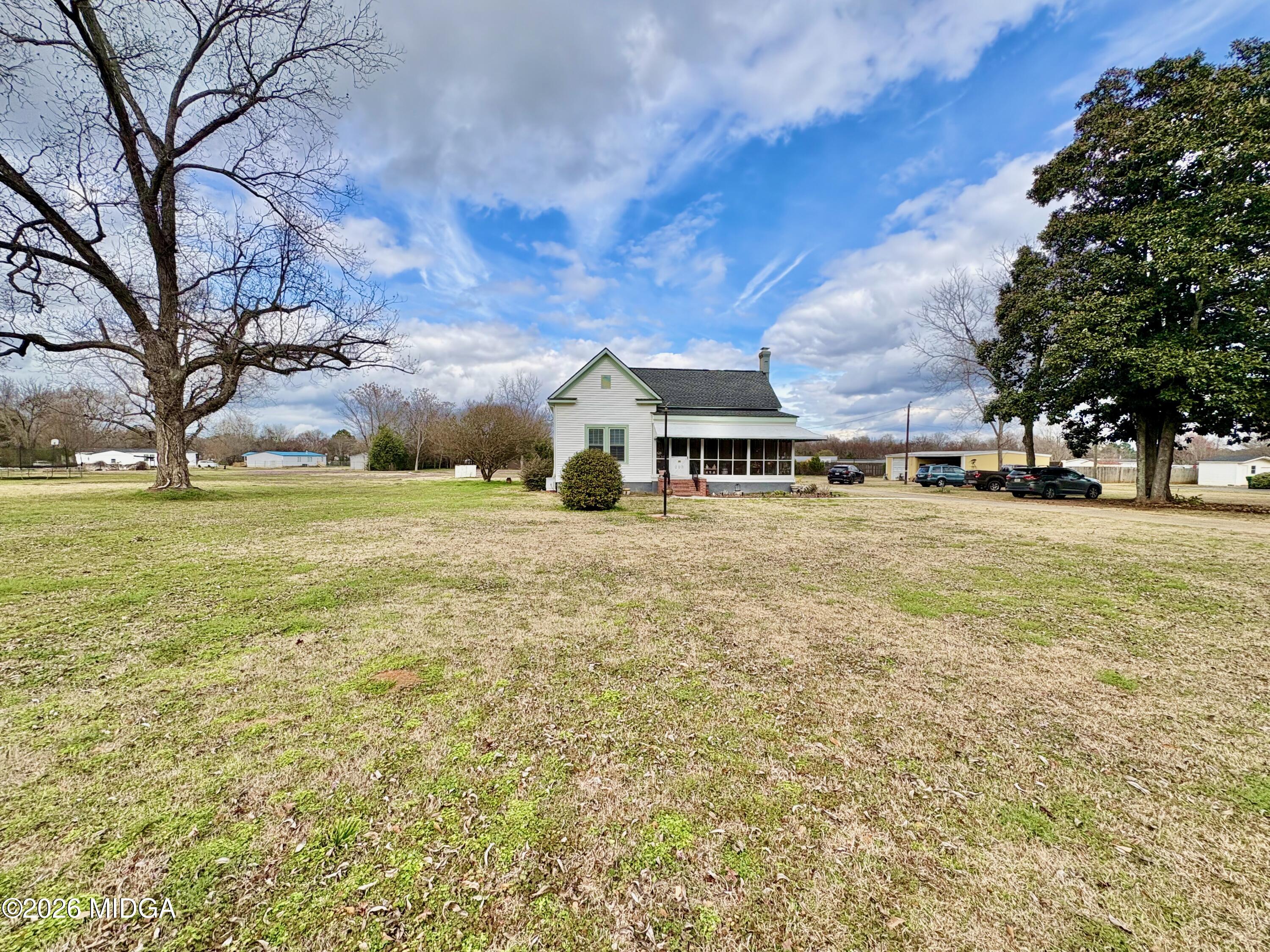 205 White Road Byron, GA 31008 - Photo 25 of 38 a view of a field with an trees