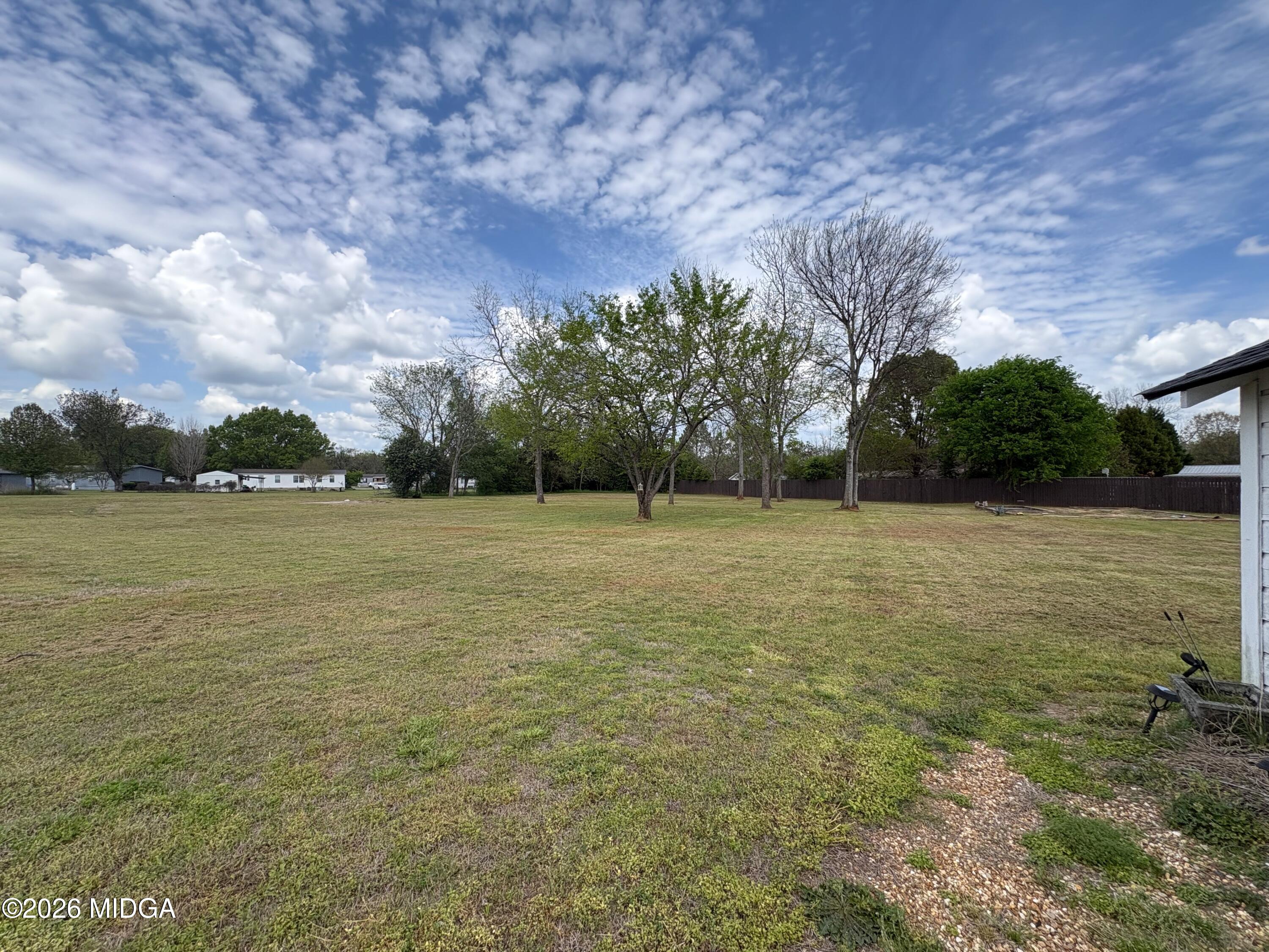 205 White Road Byron, GA 31008 - Photo 27 of 38 a view of outdoor space with deck and yard