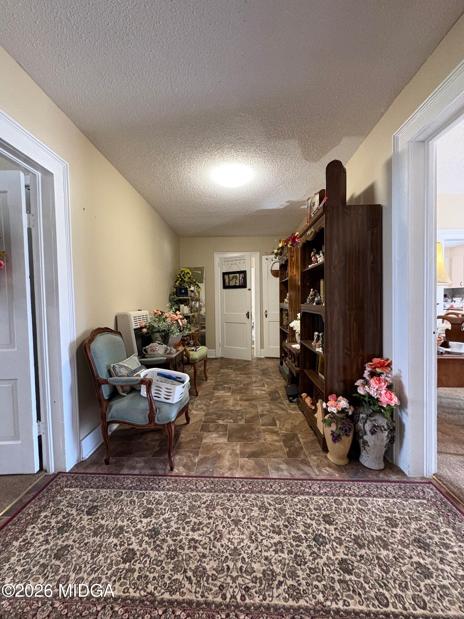 205 White Road Byron, GA 31008 - Photo 3 of 38 a view of a room with gym equipment