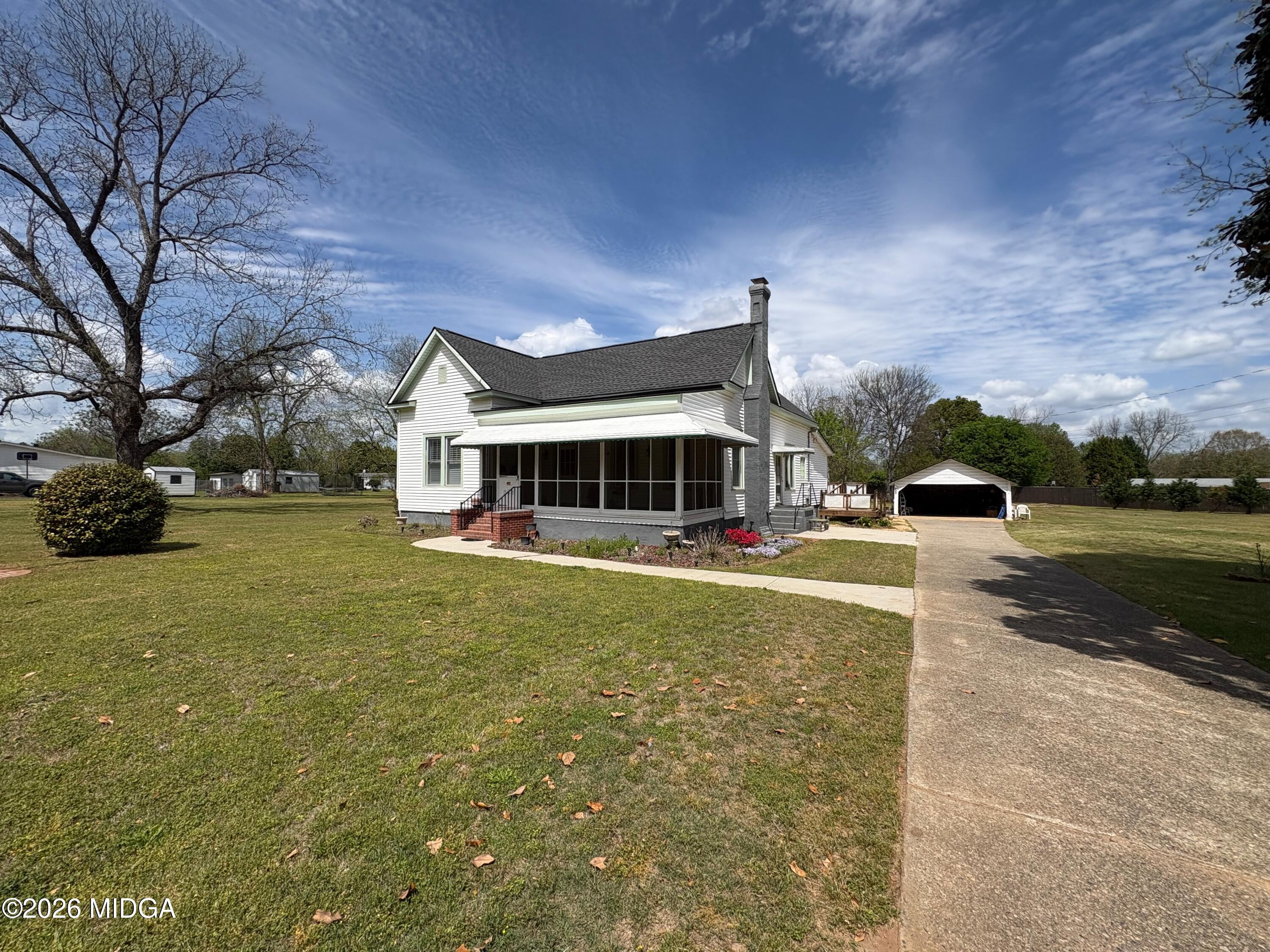 205 White Road Byron, GA 31008 - Photo 32 of 38 a front view of a house with a yard