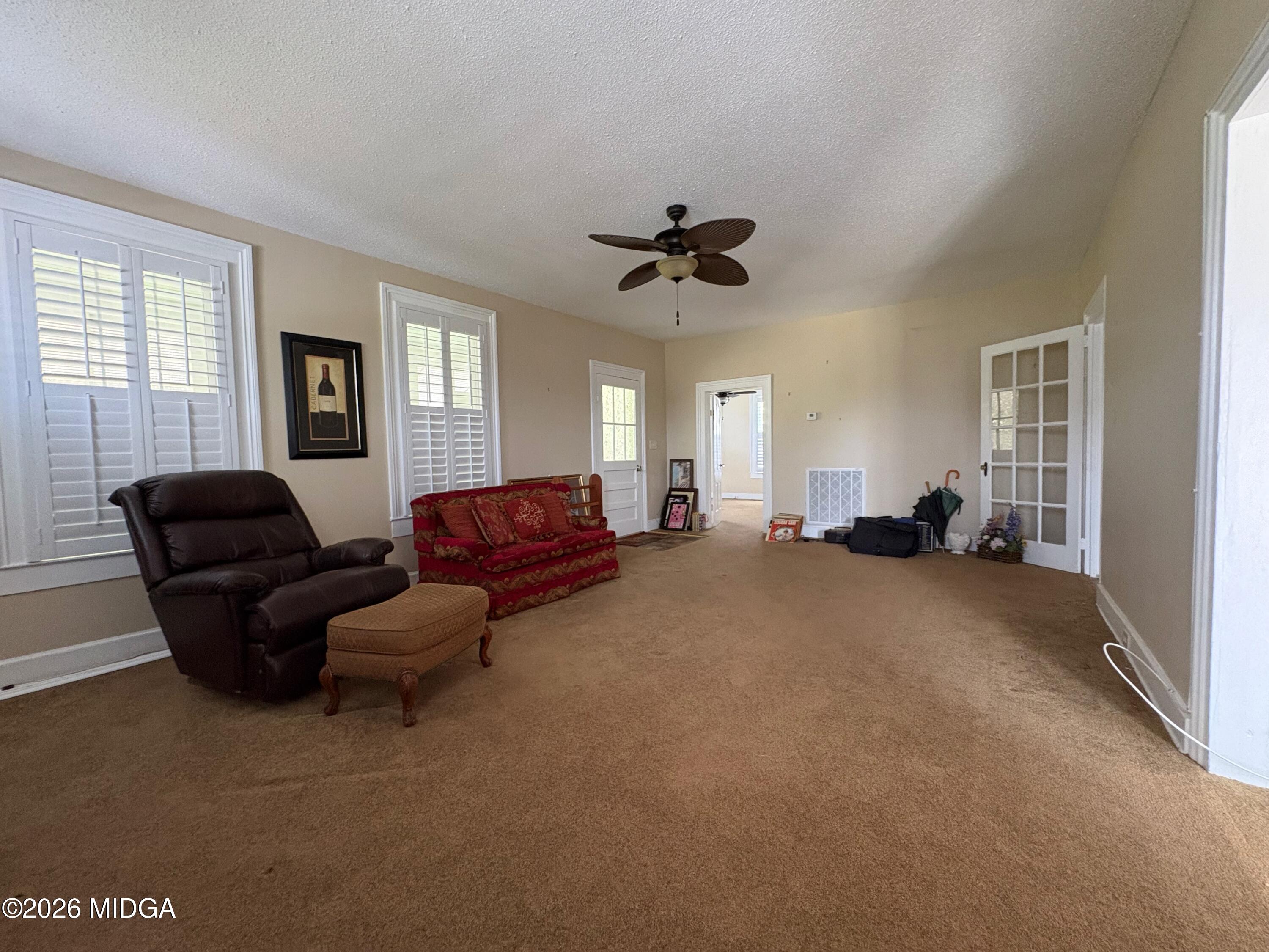 205 White Road Byron, GA 31008 - Photo 5 of 38 a living room with furniture and a window