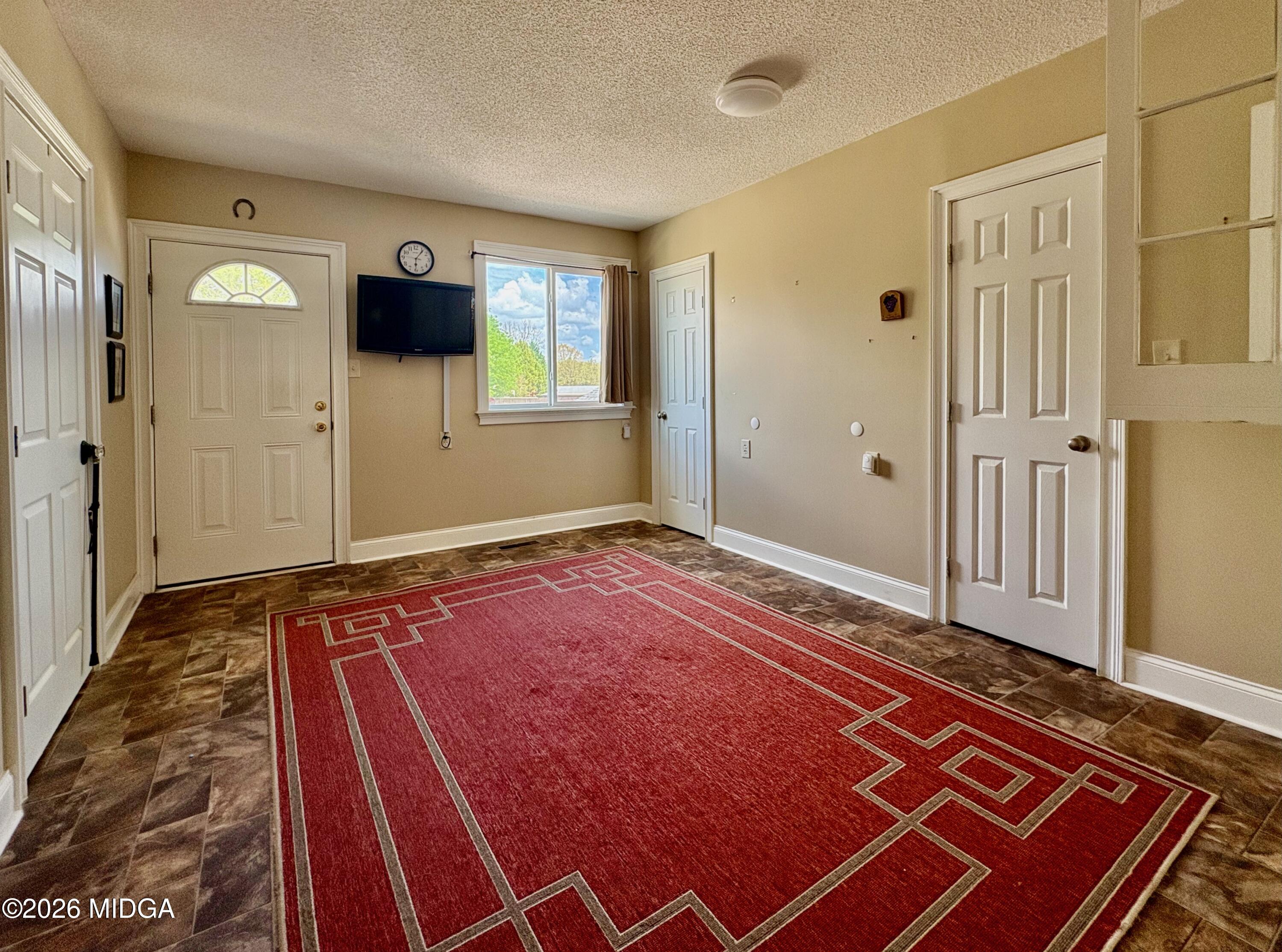 205 White Road Byron, GA 31008 - Photo 10 of 38 a bedroom with a bed and a window