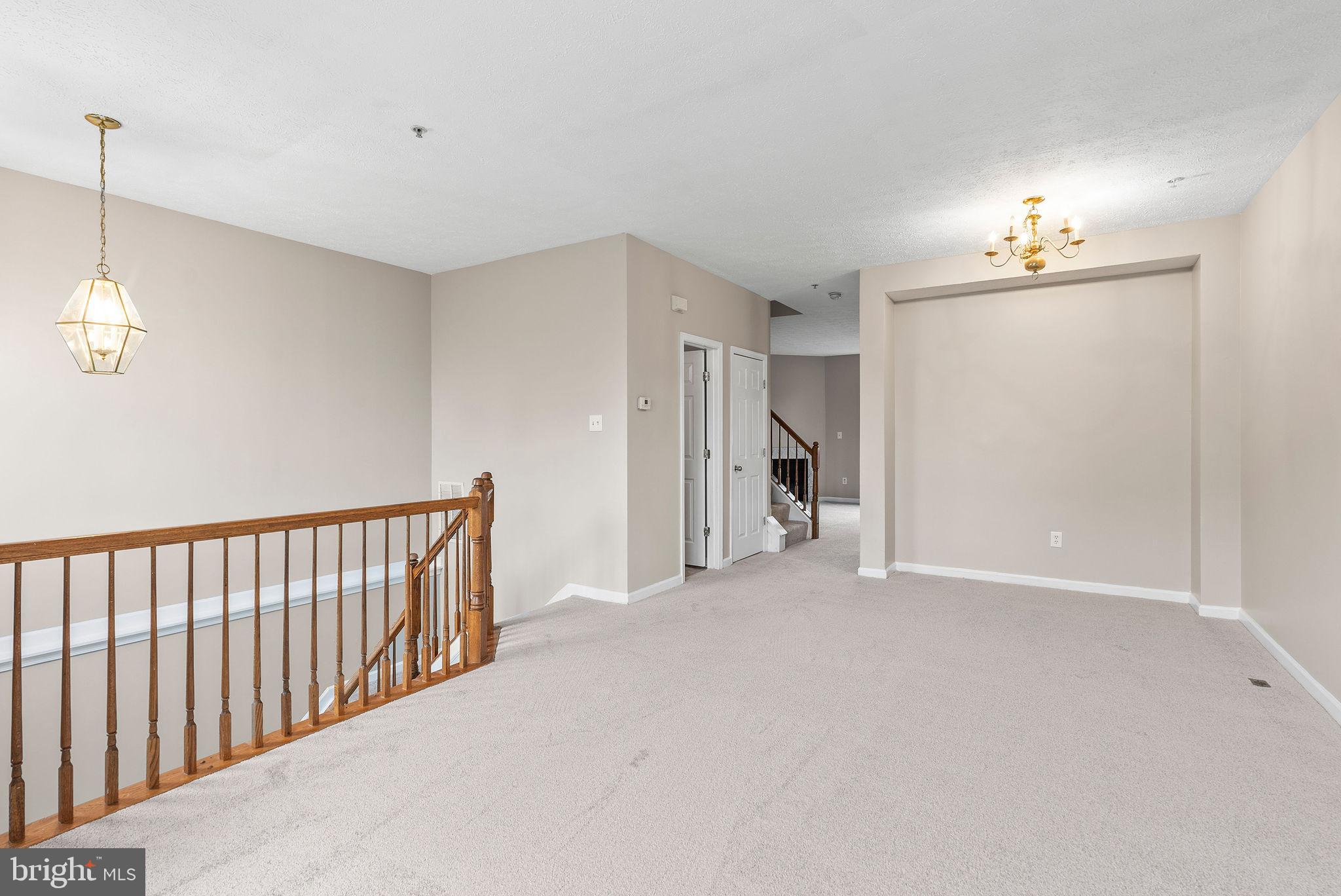 9711 Luguna Road Baltimore, MD 21220 - Photo 11 of 37 a view of empty room with a ceiling fan