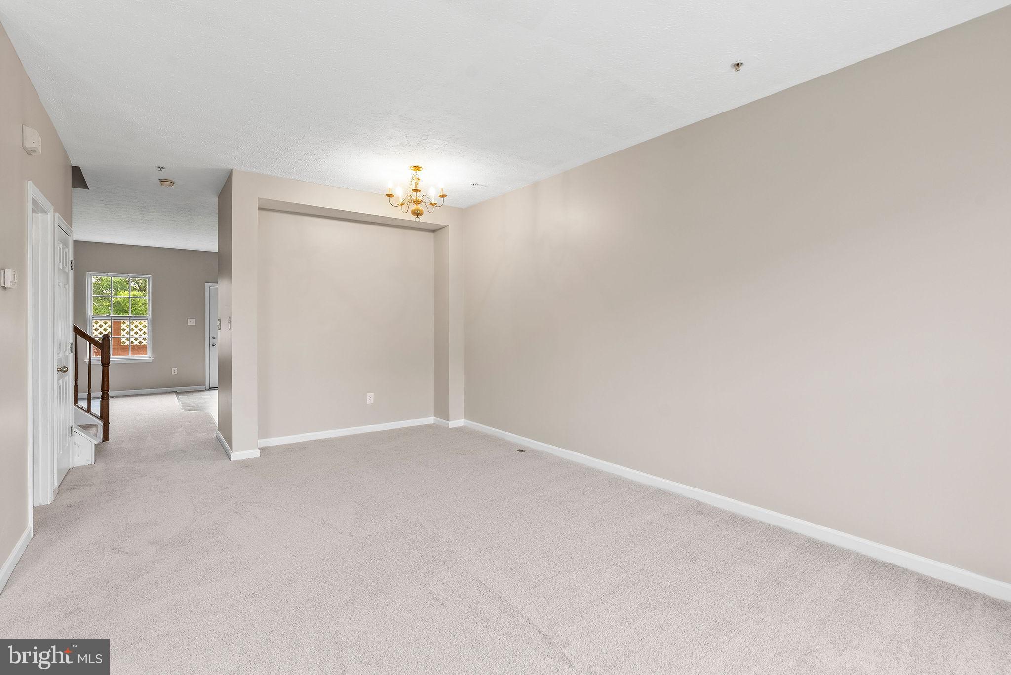 9711 Luguna Road Baltimore, MD 21220 - Photo 12 of 37 an empty room with closet and mirror