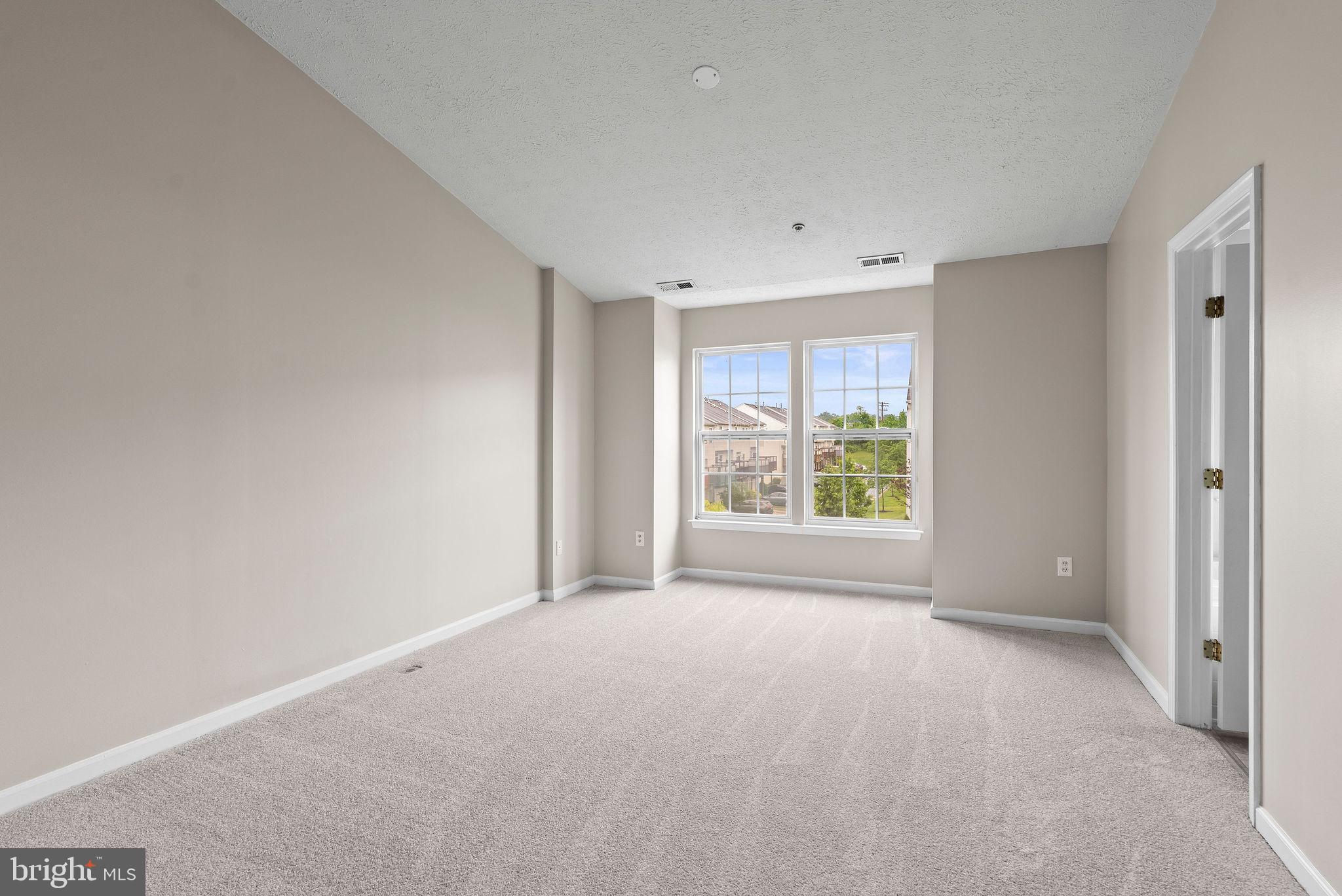 9711 Luguna Road Baltimore, MD 21220 - Photo 13 of 37 a view of an empty room with a window