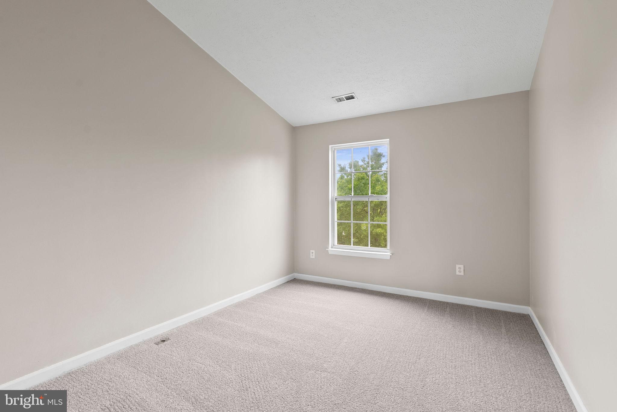 9711 Luguna Road Baltimore, MD 21220 - Photo 30 of 37 an empty room with a window