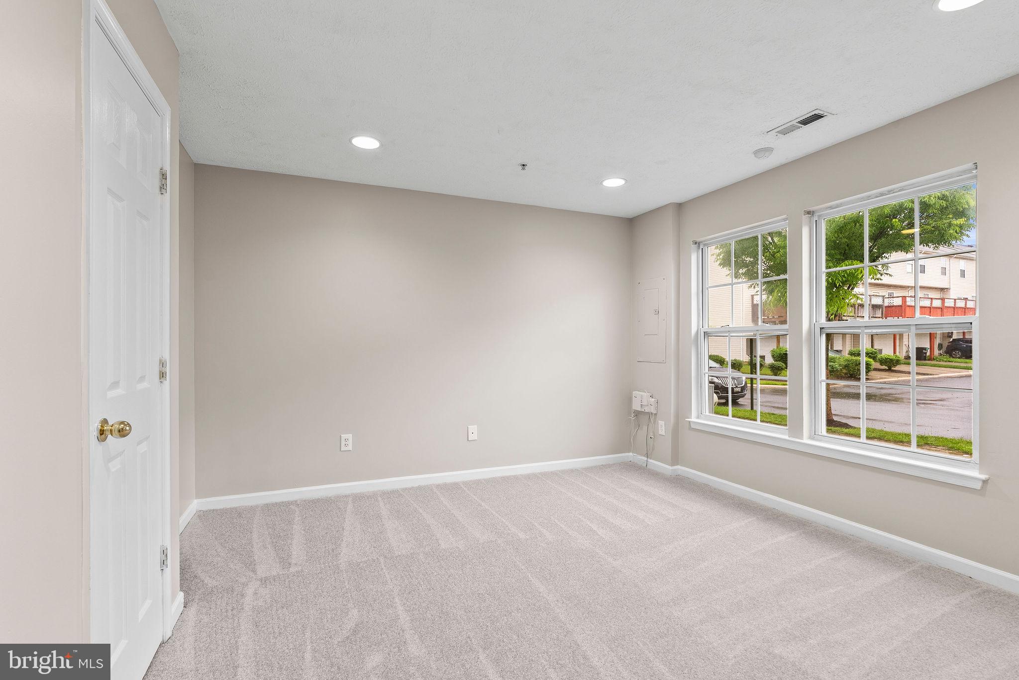 9711 Luguna Road Baltimore, MD 21220 - Photo 3 of 37 a view of an empty room with a window