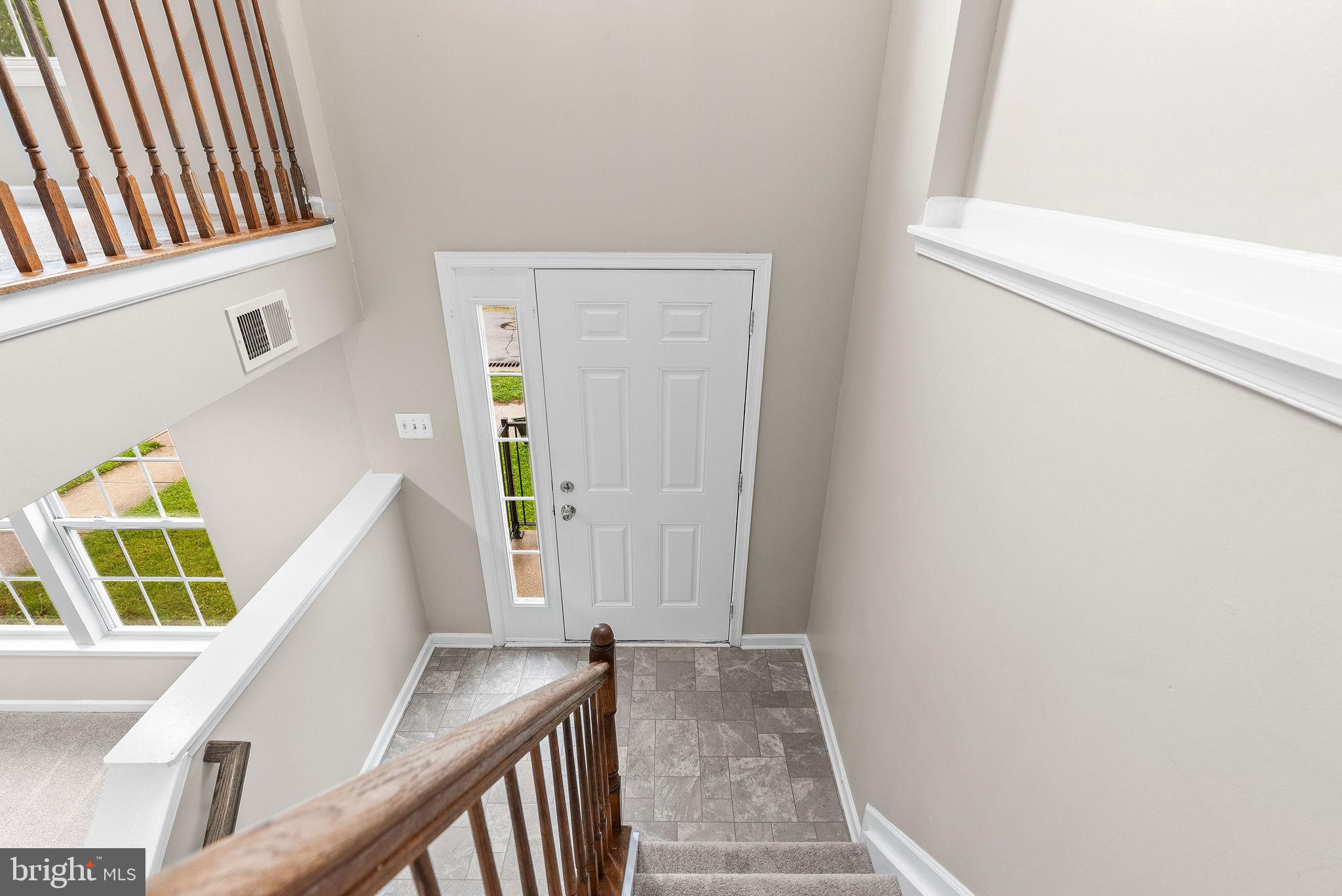 9711 Luguna Road Baltimore, MD 21220 - Photo 8 of 37 a view of an entryway with staircase