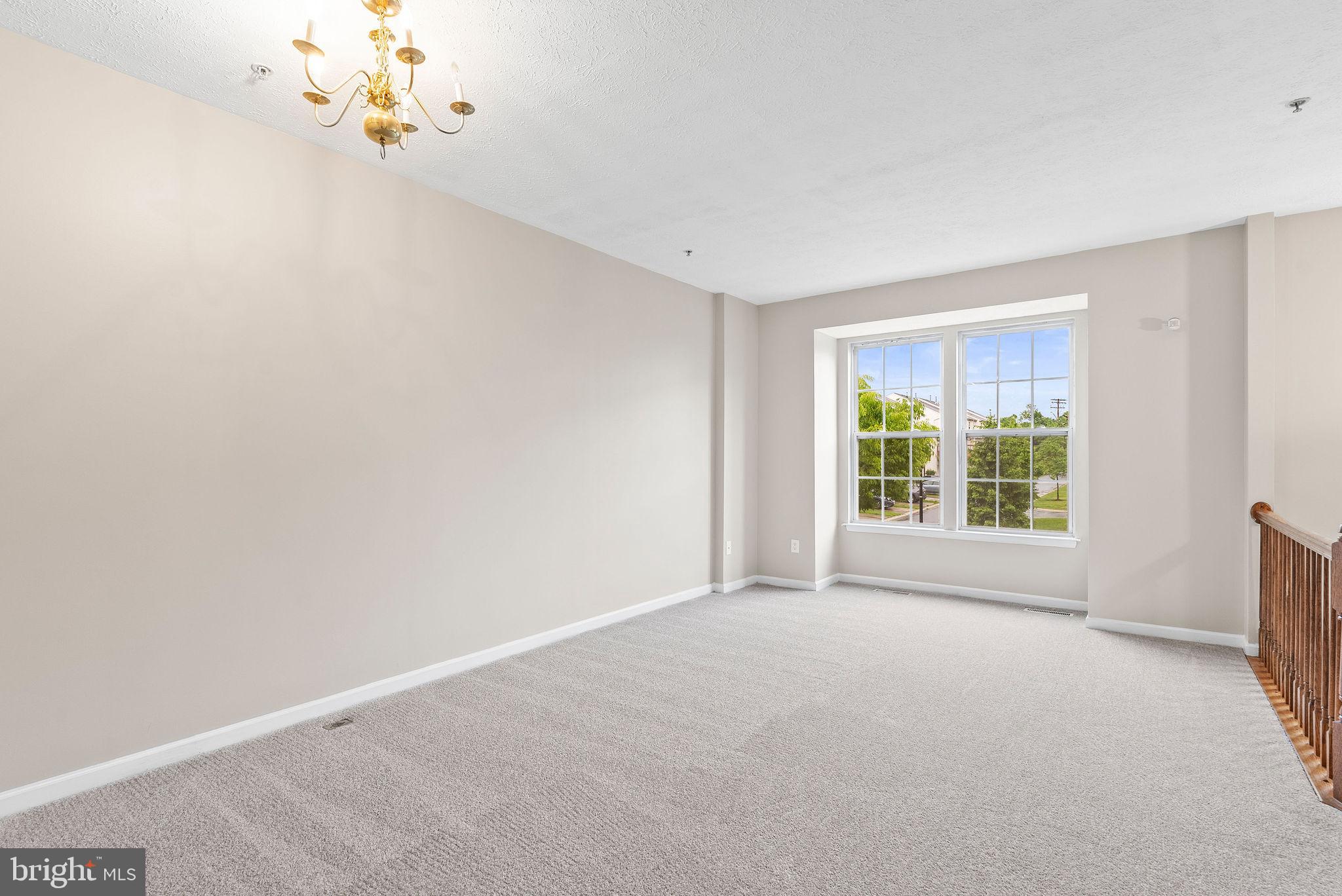 9711 Luguna Road Baltimore, MD 21220 - Photo 9 of 37 a view of an empty room with a window