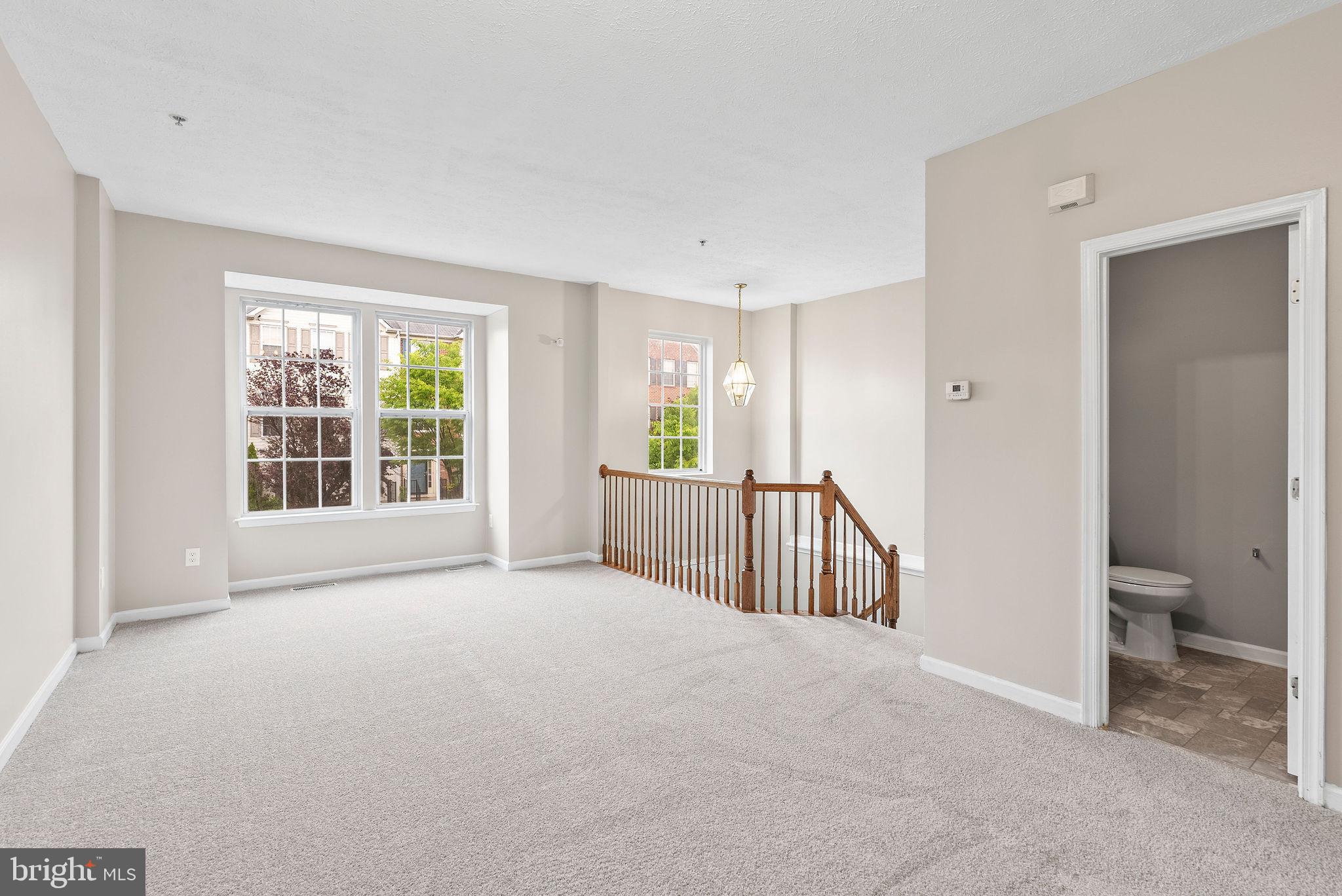 9711 Luguna Road Baltimore, MD 21220 - Photo 10 of 37 a view of an empty room with a window