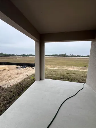 a view of an ocean and mountain