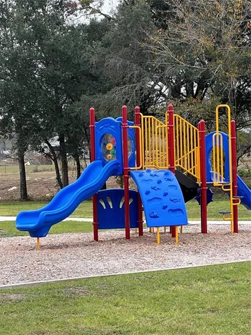 a view of a park with slide