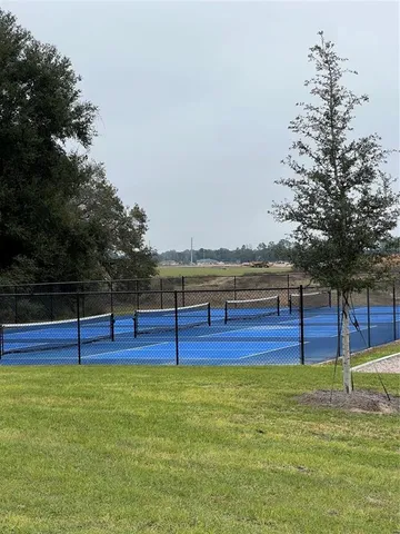 a view of a yard with an empty space