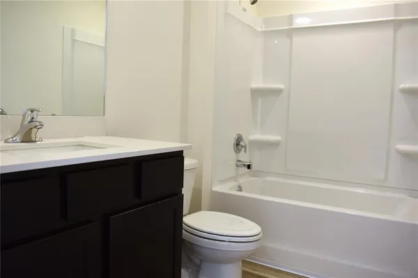 a bathroom with a sink and a toilet
