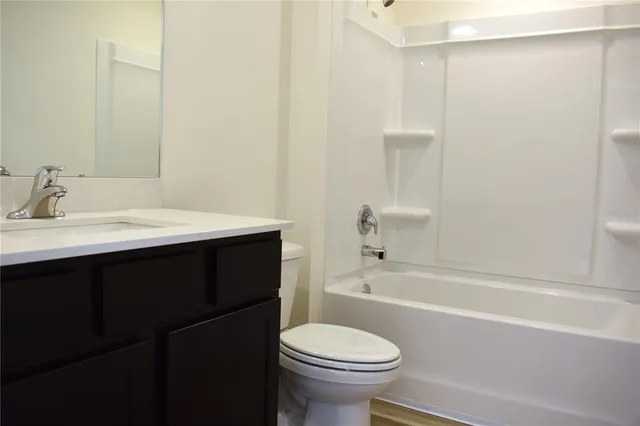 a bathroom with a sink and a toilet