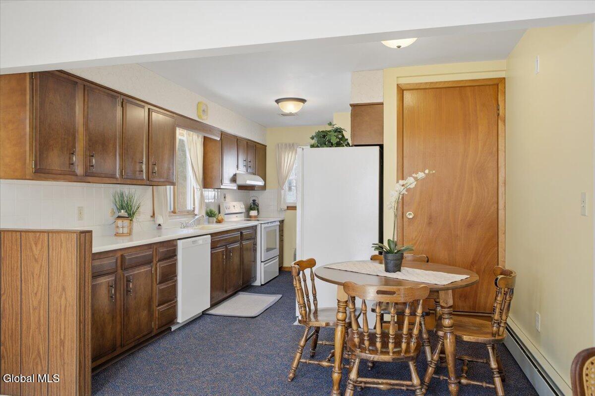 7132 Fuller Station Road Guilderland, NY 12303 - Photo 6 of 20 Accentuated with rustic wood tones.