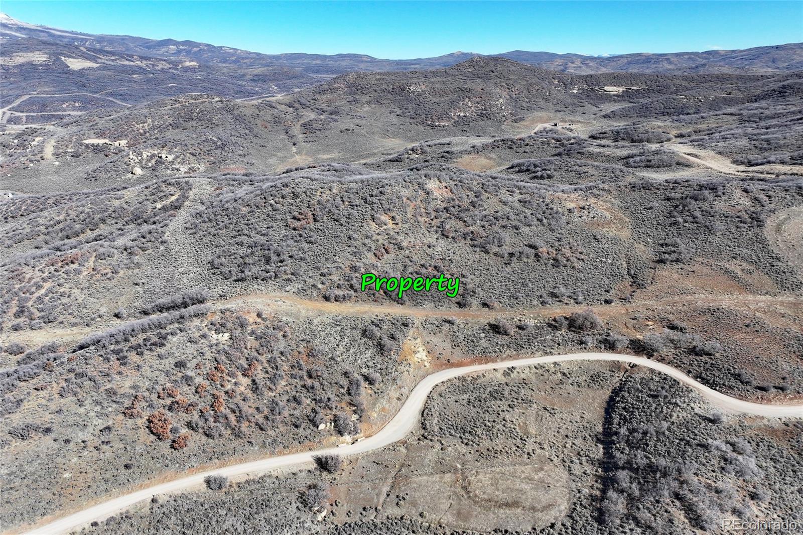 0 Harrison Gulch Road Collbran, CO 81624 - Photo 11 of 11 a view of a dry yard with mountain