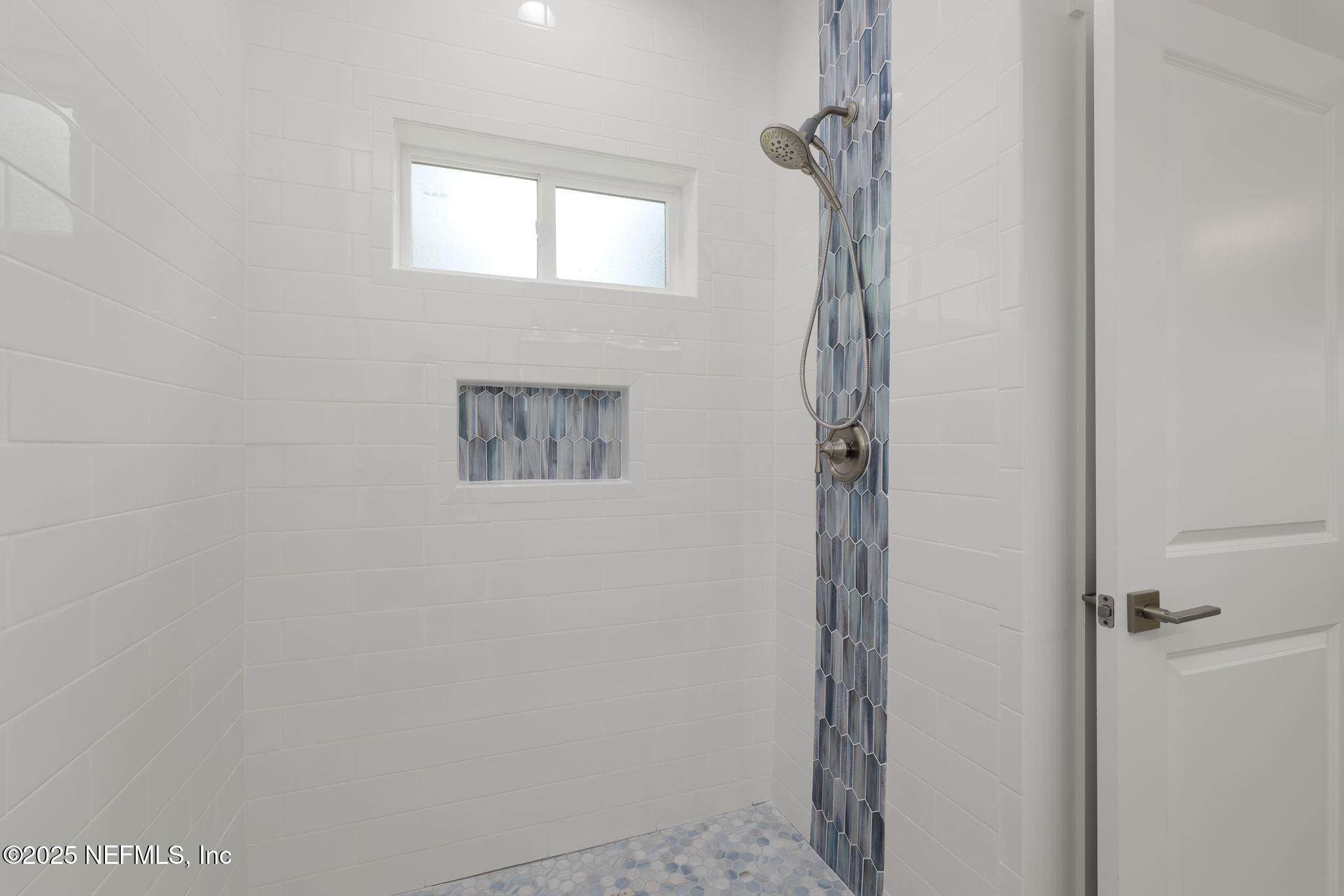 603 Twenty Second Street St. Augustine, FL 32084 - Photo 20 of 36 a bathroom with a shower