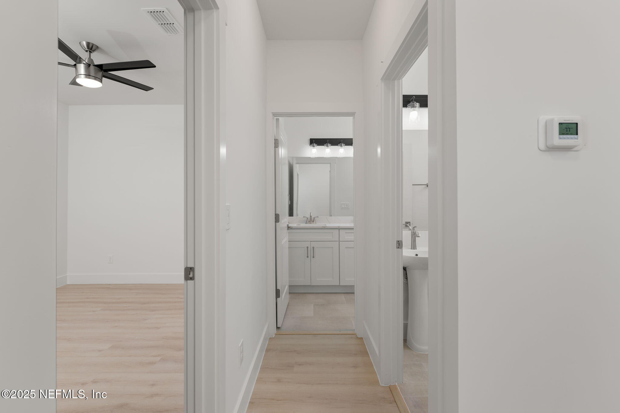 603 Twenty Second Street St. Augustine, FL 32084 - Photo 22 of 36 a view of a bathroom from a hallway