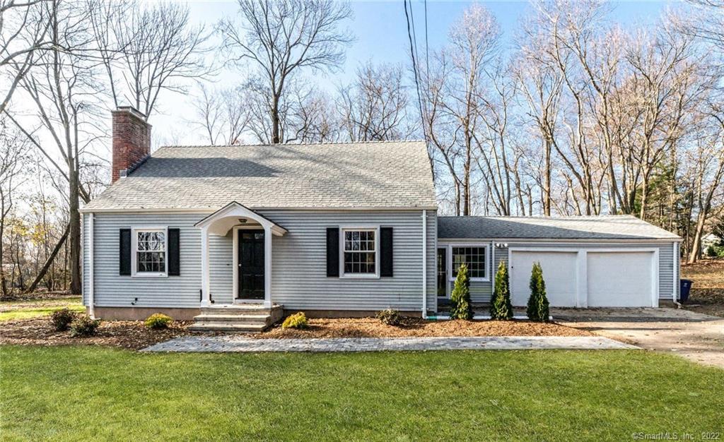 502 Ferry Road Orange, CT 06477 - Photo 1 of 1 a front view of house with yard