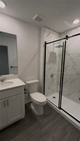 an empty room with a empty space and window