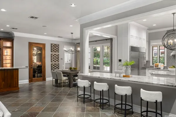 a view of a dining room with furniture window and outside view