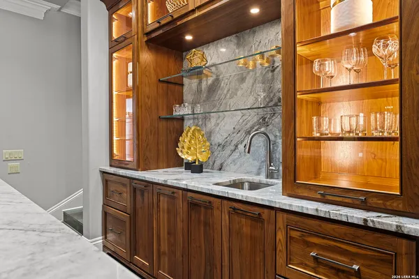 a large bathroom with double sink and a large mirror