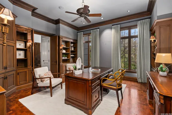 a view of walk in closet and bedroom