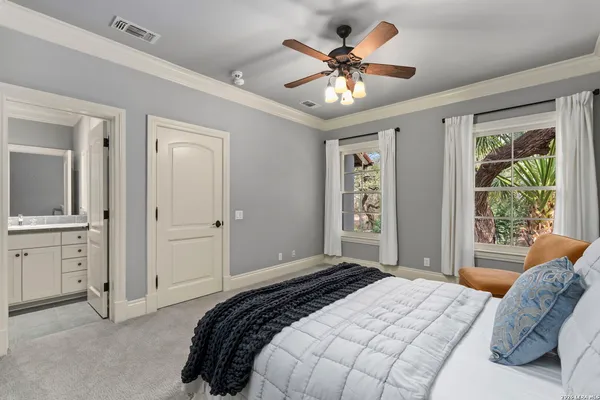 a front view of a house with swimming pool having outdoor seating