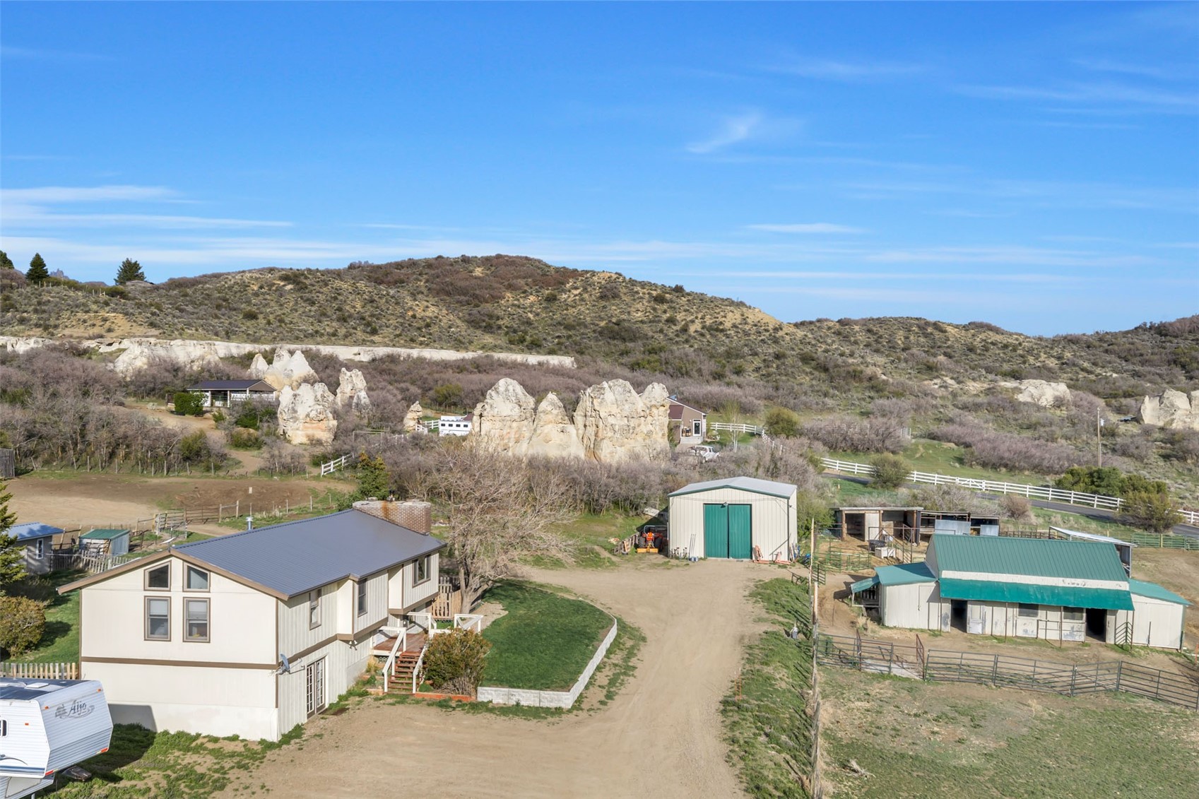 224 C R 206 Craig, CO 81625 - Photo 34 of 50 an aerial view of residential houses with outdoor space and trees