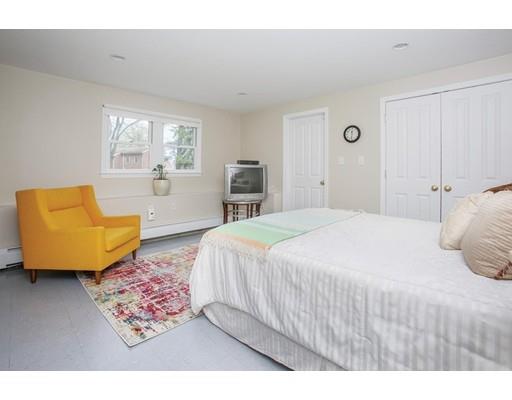 21 Lawrence Lane Lexington, MA 02421 - Photo 12 of 18 a bedroom with a bed and couch