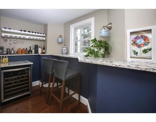 21 Lawrence Lane Lexington, MA 02421 - Photo 14 of 18 a kitchen with a table and chairs in it