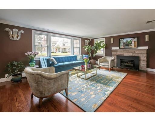 21 Lawrence Lane Lexington, MA 02421 - Photo 3 of 18 a living room with furniture and a fireplace