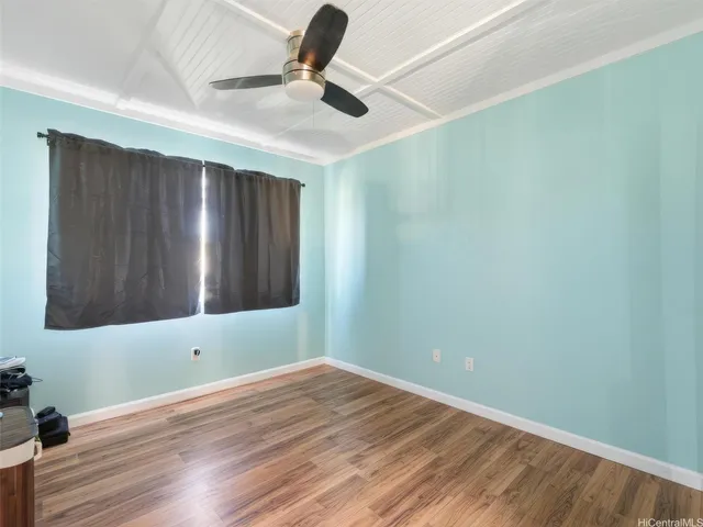 a backyard of a house with yard and outdoor seating