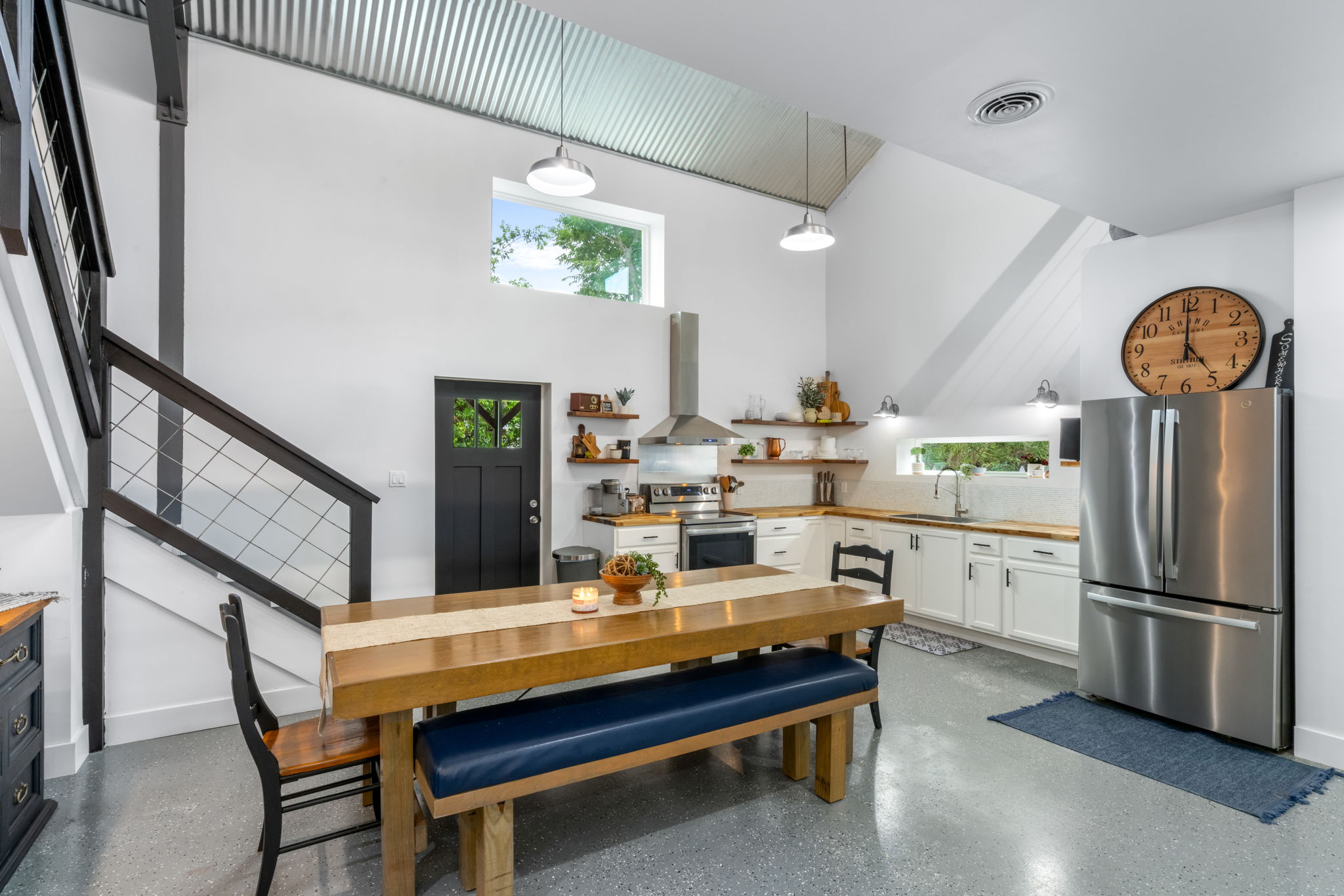 180 Henly Loop Dripping Springs, TX 78620 - Photo 12 of 38 a room with table chairs and entryway