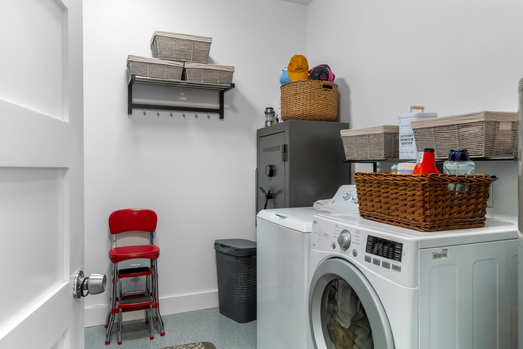 180 Henly Loop Dripping Springs, TX 78620 - Photo 21 of 38 a utility room with dryer and washer
