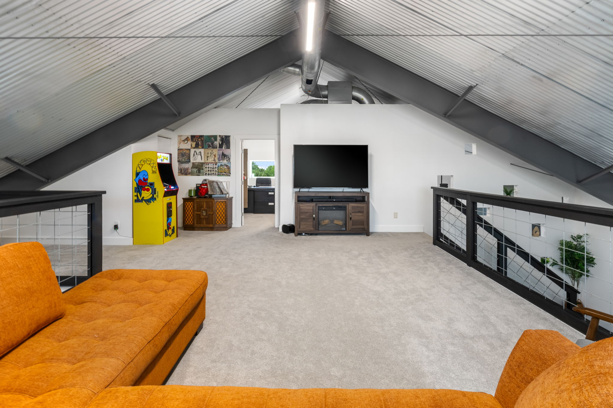 180 Henly Loop Dripping Springs, TX 78620 - Photo 23 of 38 a living room with furniture and a flat screen tv